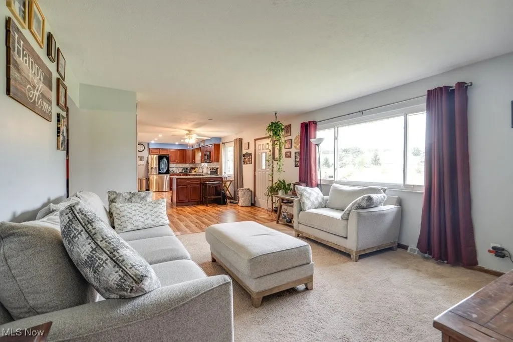 Living room featuring light wood-style flooring