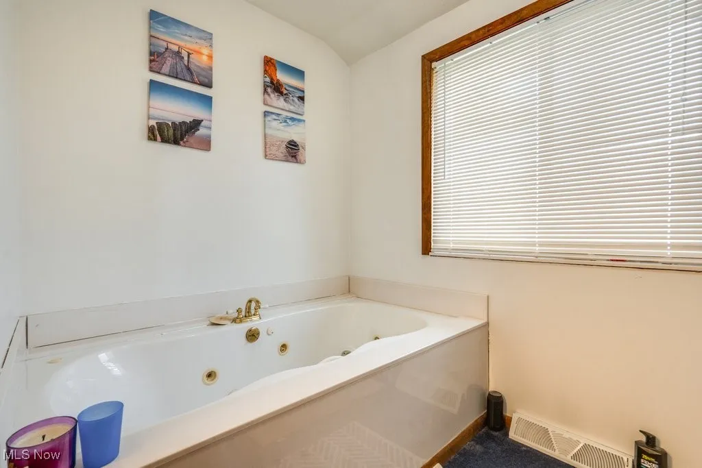 Bathroom featuring a jetted tub