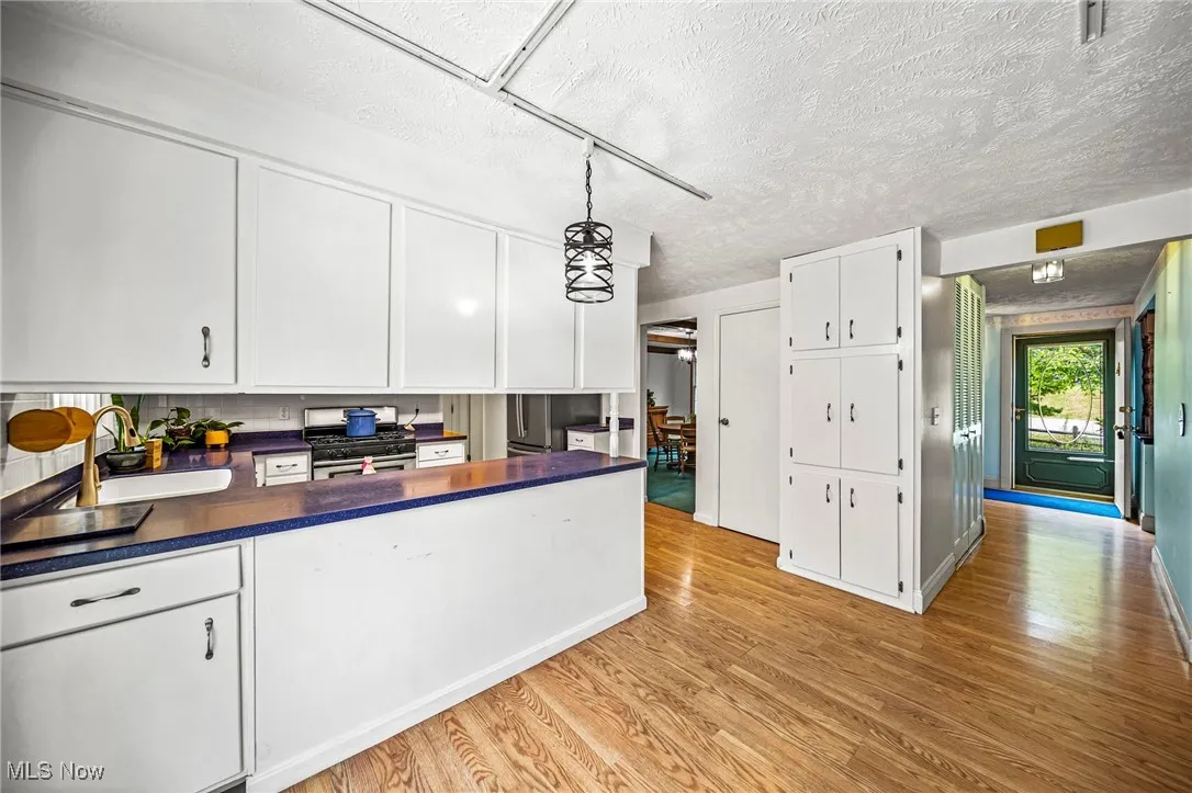 Dining area looking into kitchen