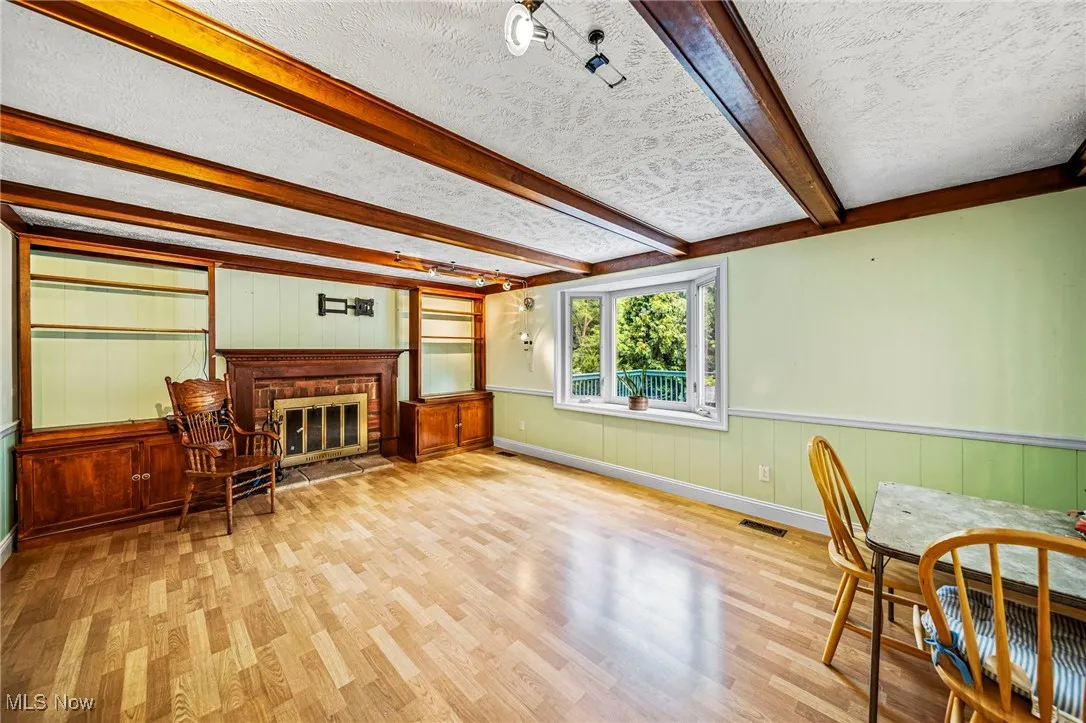 Family room with fireplace and new bay window