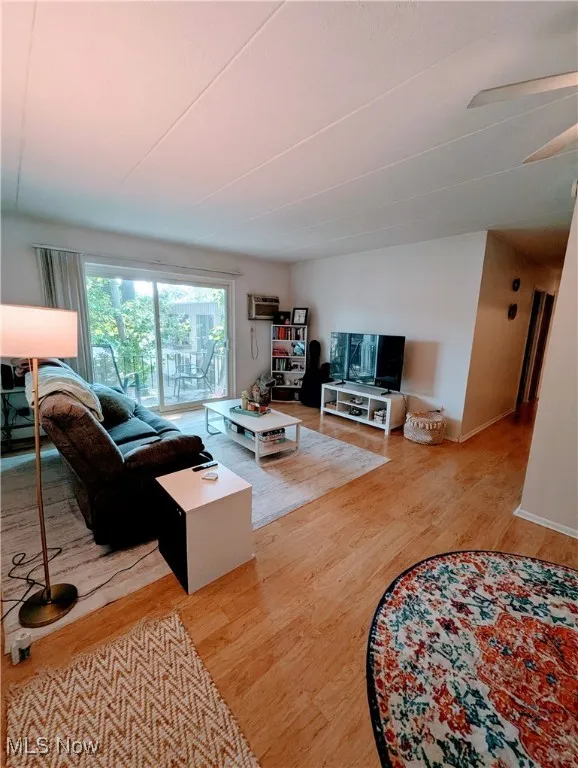 Living room with laminate floors and baseboards
