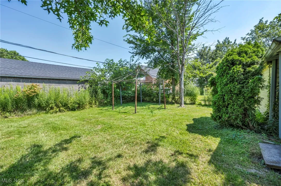 View of green lawn featuring a gazebo