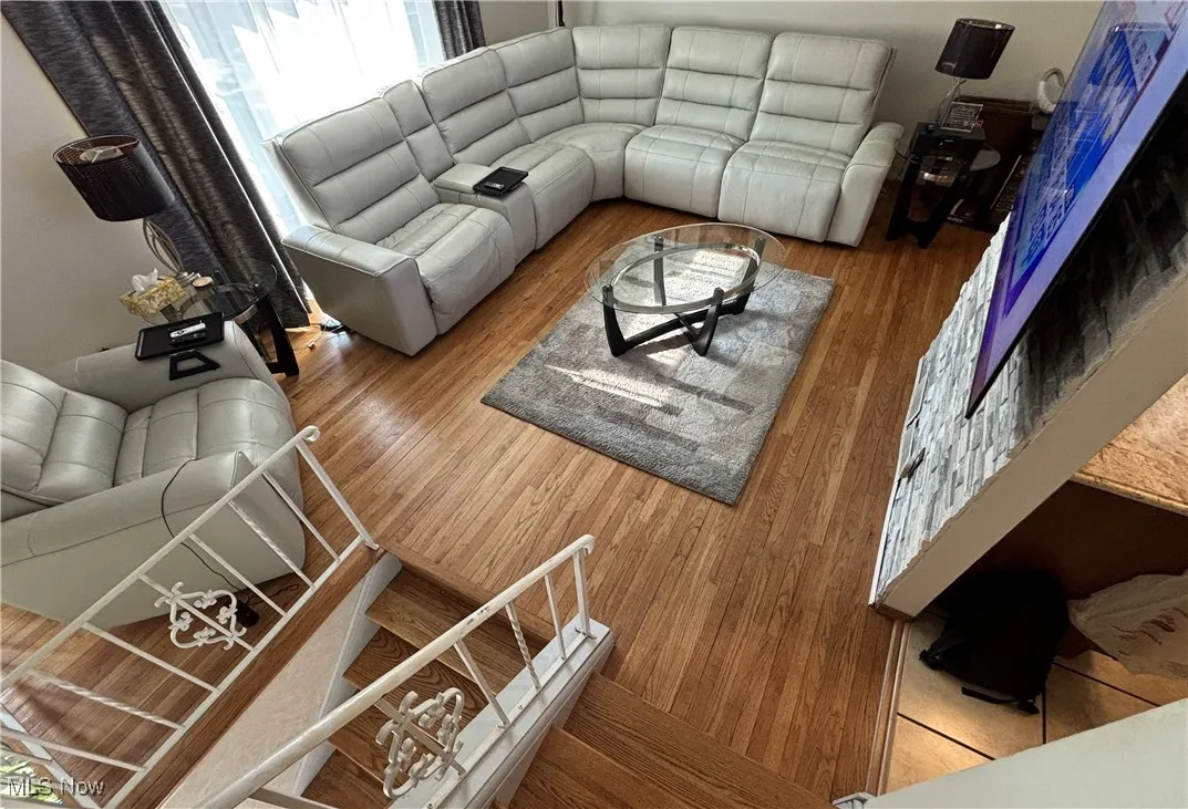Living room featuring wood finished floors