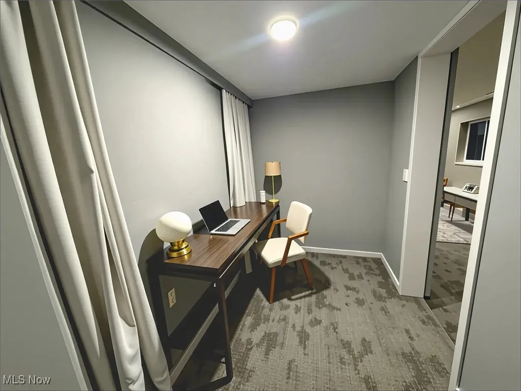Office featuring carpet floors and baseboards