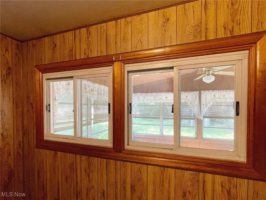Pretty vinyl windows, with a look into the sunroom.