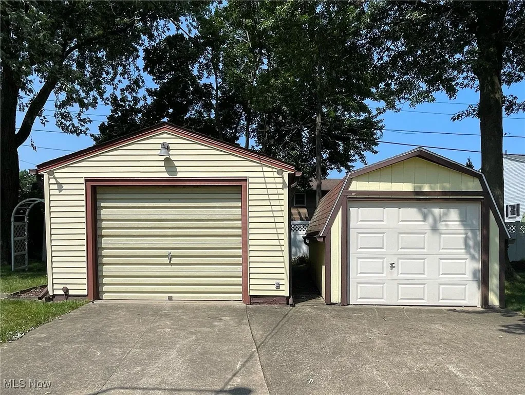 Detached garage and outbuilding that will hold a small car!