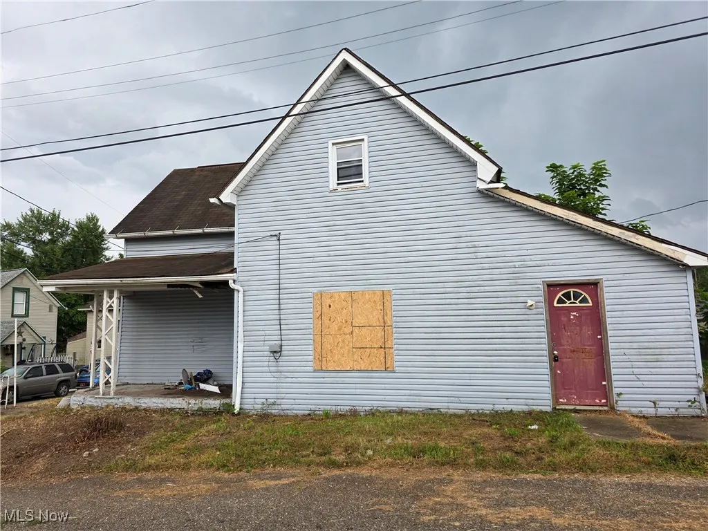 212 Thompson Street, Uhrichsville, Ohio,MLS Now Listing ID