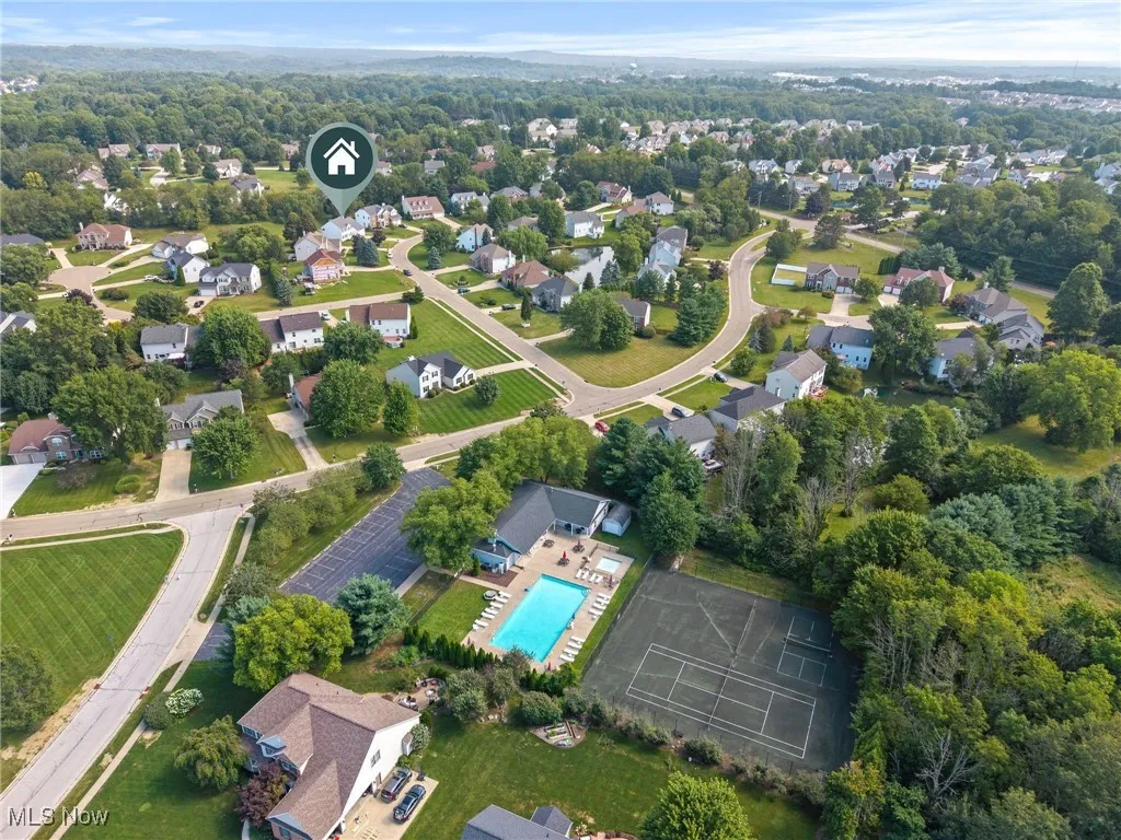Aerial overview of property's location and the Clubhouse pool area