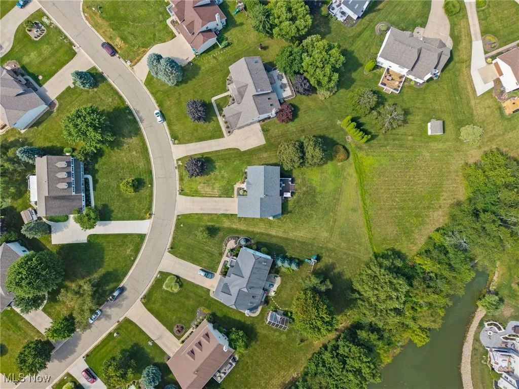 View of property location with nearby suburban area