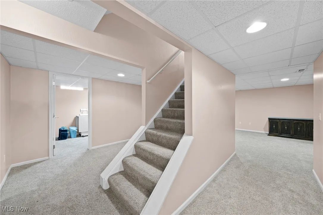 Stairway featuring carpet floors, and recessed lighting