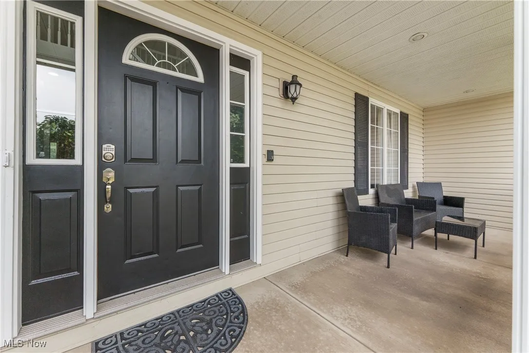 Entrance to property with a porch