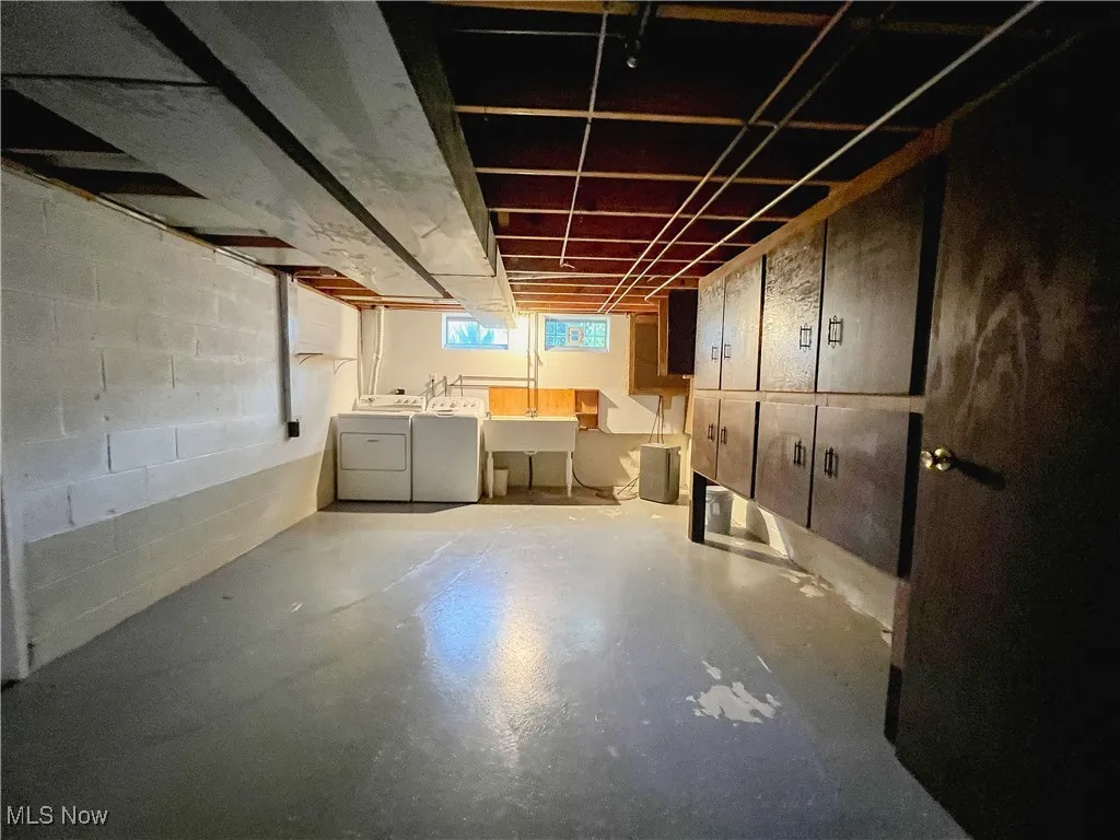 Basement featuring washer and dryer