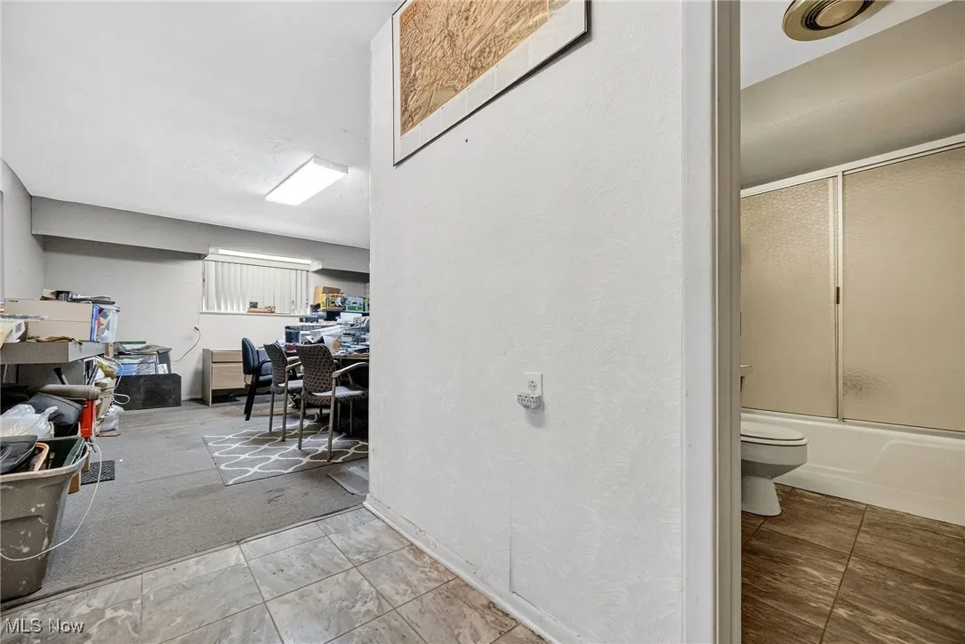 5th Bedroom ,office (current use) or possible In-Law suite with private entrance and bathroom.