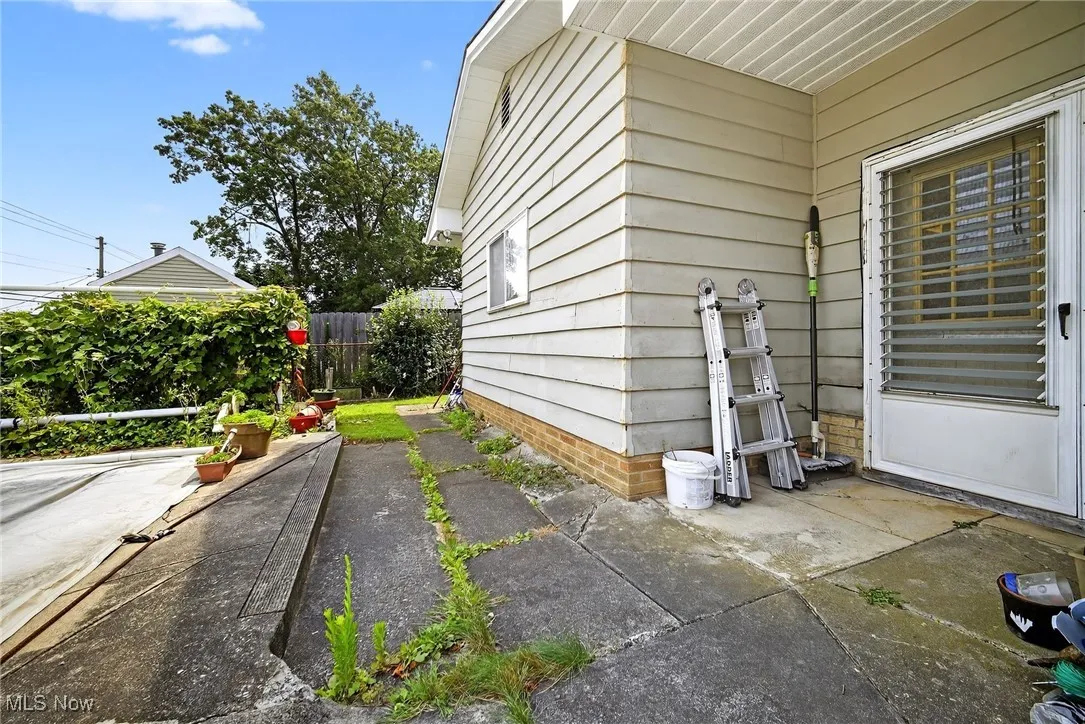 View of home's exterior with a patio