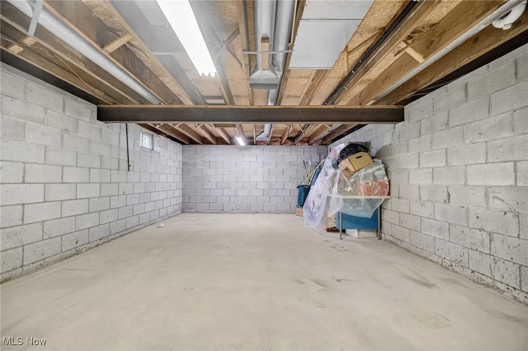 Basement under the addition with rough-in plumbing for a bathroom and kitchen.
