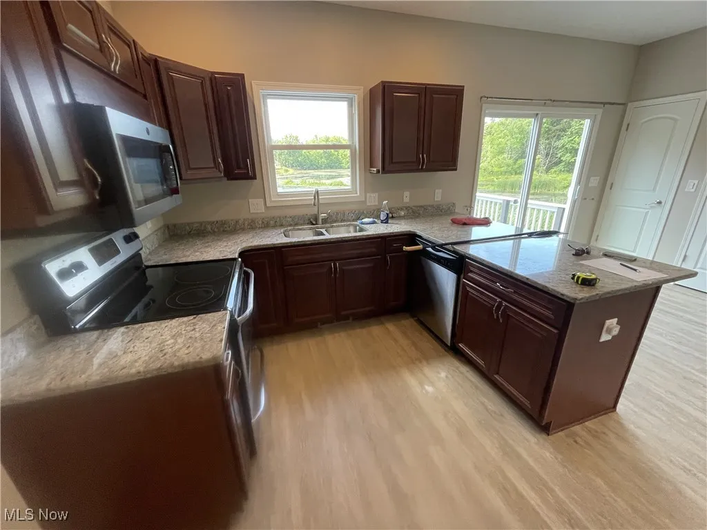 992 Bennington Court, Lakemore, Ohio,MLS Now Listing ID