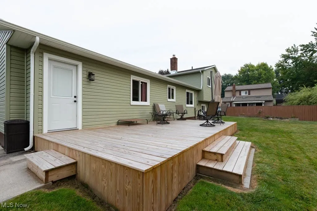 Wooden terrace with outdoor dining area