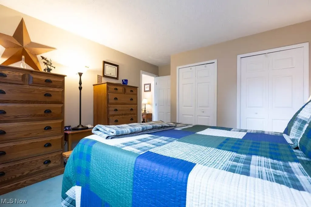 Bedroom with multiple closets