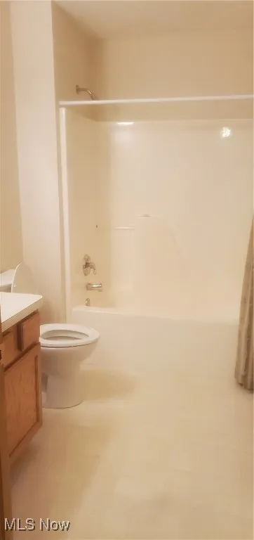 Bathroom featuring vanity and bathtub / shower combination