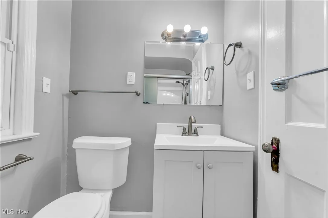 Bathroom featuring toilet and vanity