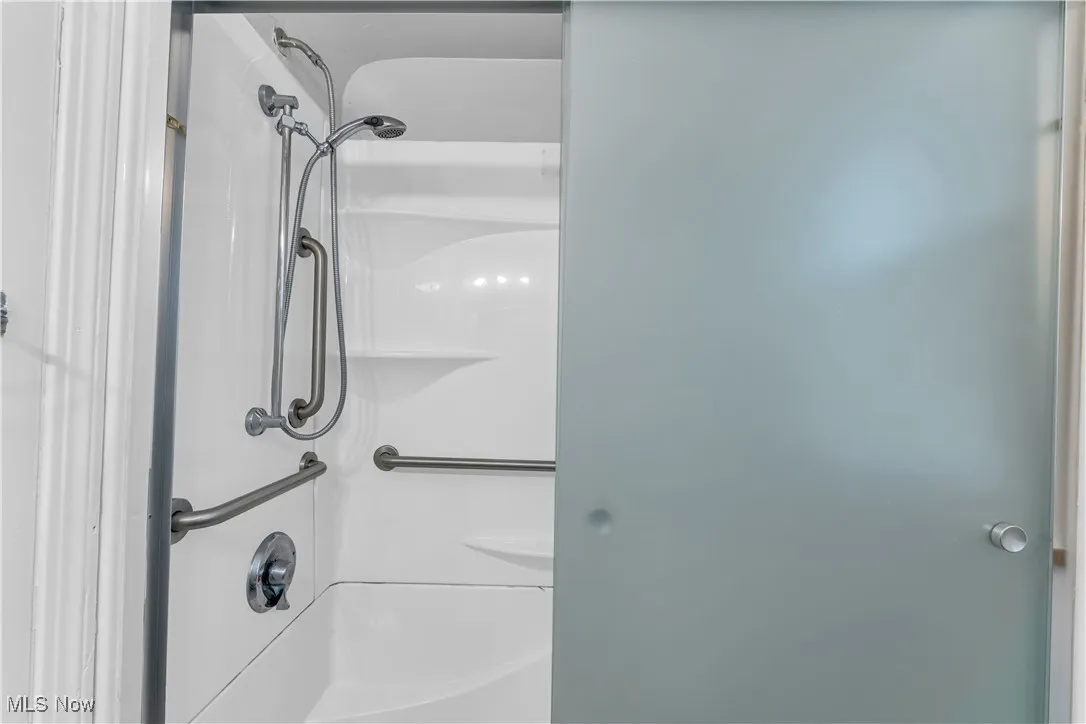 Full bath featuring shower / bathtub combination