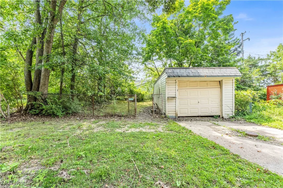 Garage with concrete driveway
