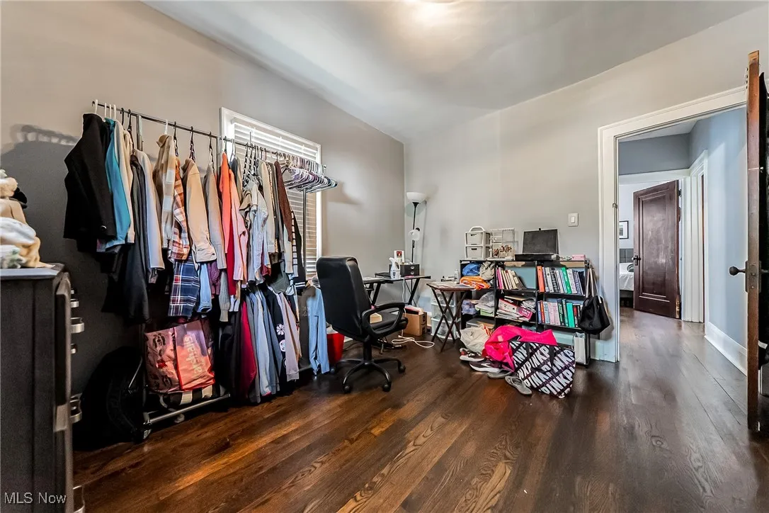 Office area with wood finished floors and baseboards
