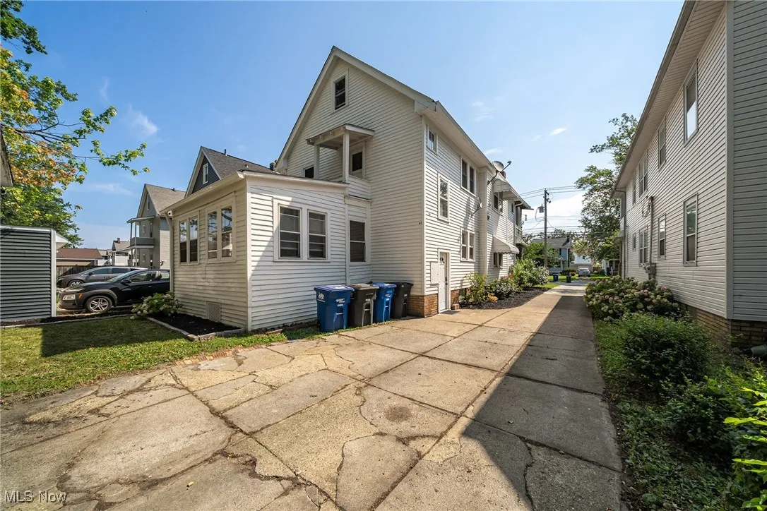 View of side of property featuring a residential view