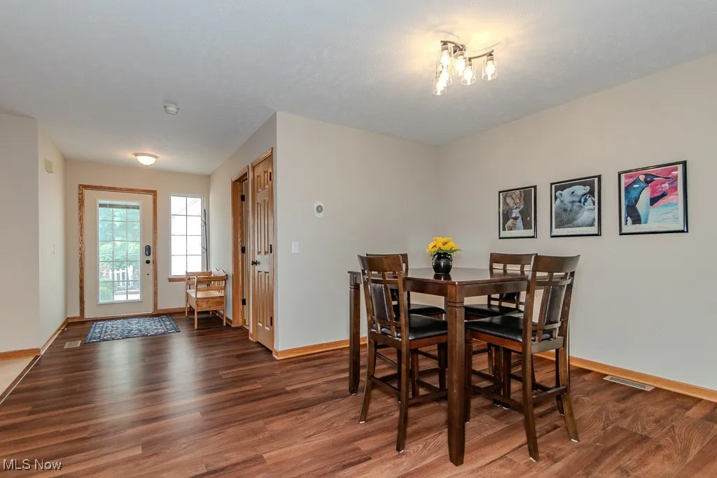 Dining area with wood finished floors