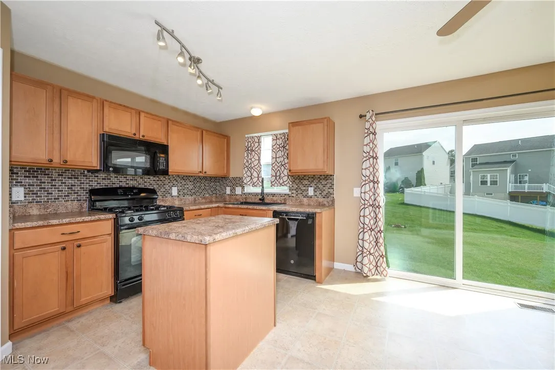 Kitchen with view of patio door