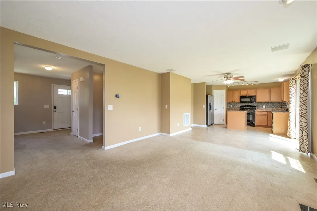 Living room open floor plan to the kitchen