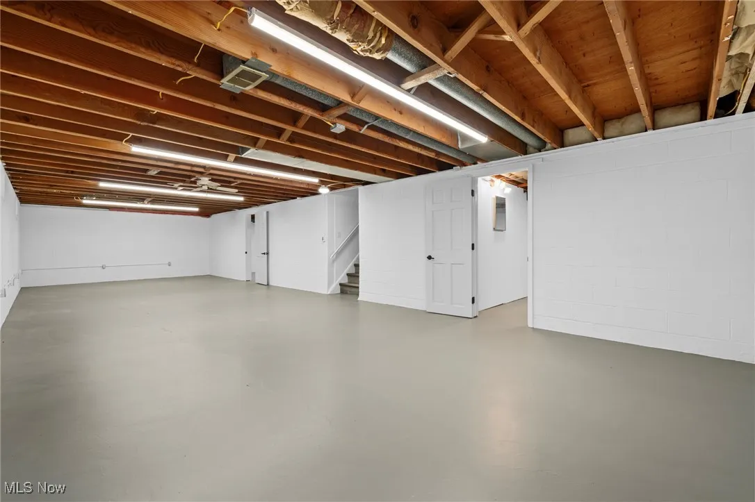 Finished below grade area featuring stairway