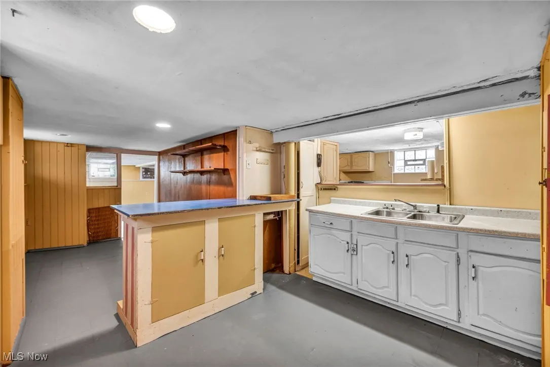 With sink and cabinets.