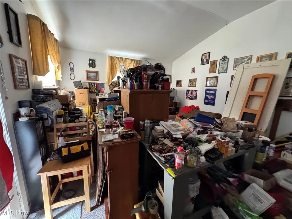 Misc room with lofted ceiling