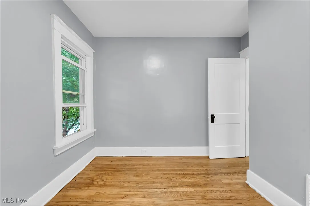 Spare room featuring light wood-style flooring