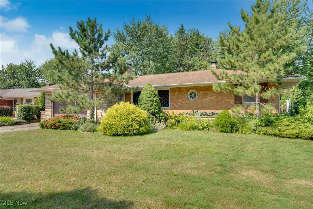 Well-maintained brick and stone ranch in desirable Alberta Estates