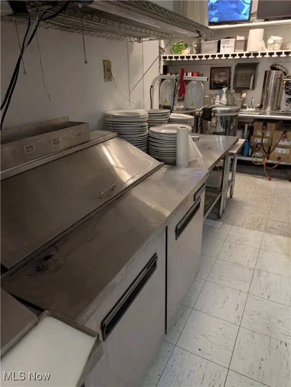 Kitchen with stainless steel countertops