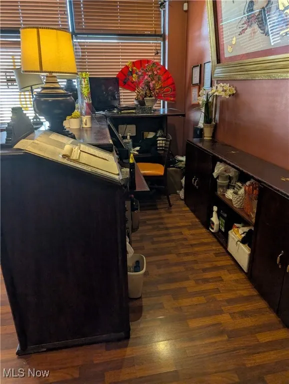 Home office with wood finished floors