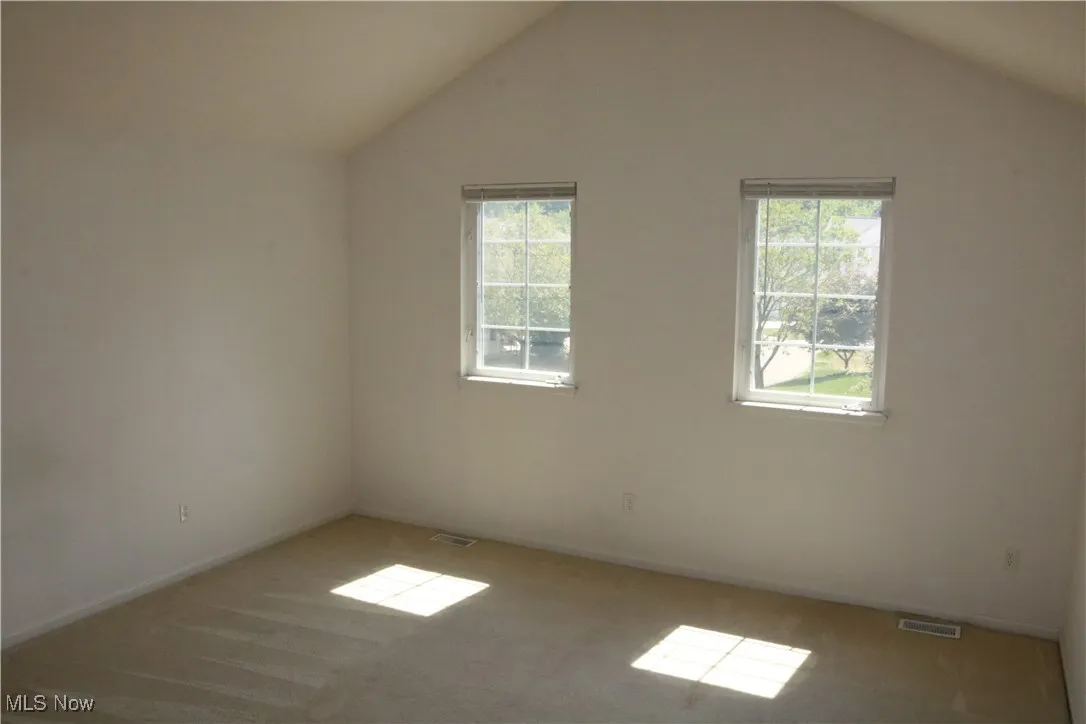 Second floor bedroom with Cathedral ceilings