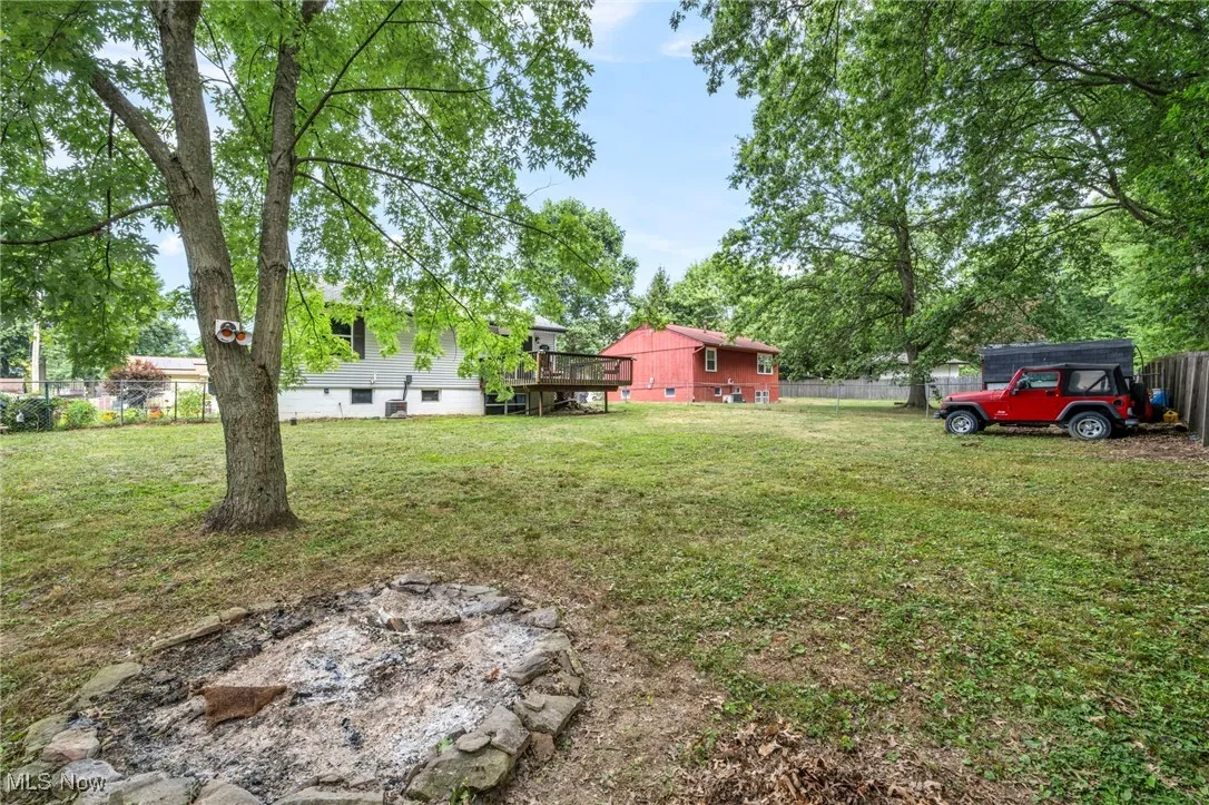 Fenced yard with a wooden deck