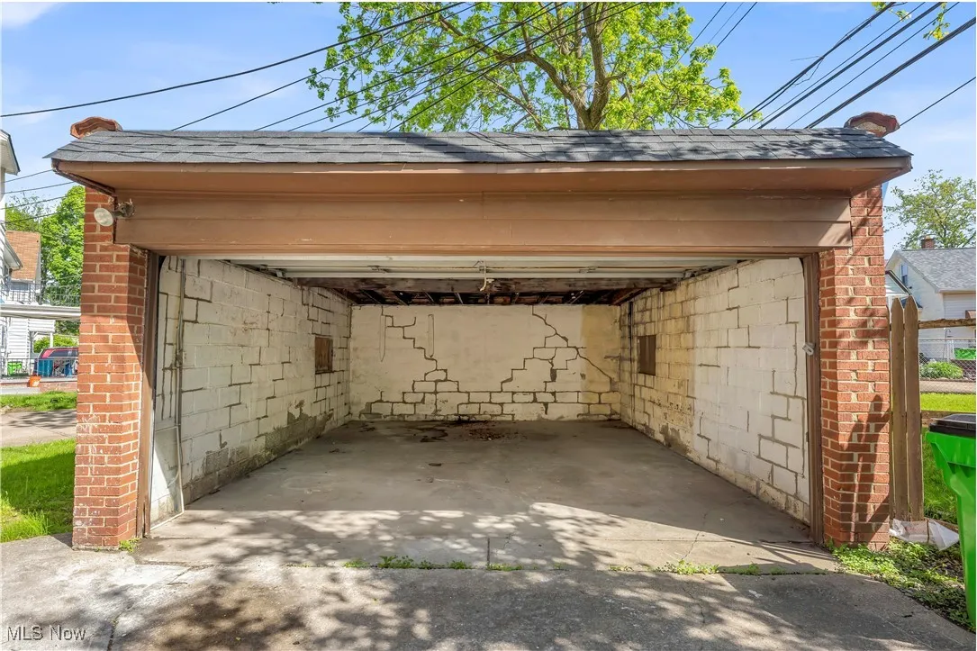 View of patio / terrace featuring a garage