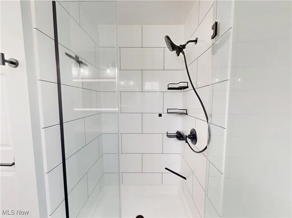 Bathroom with a shower stall
