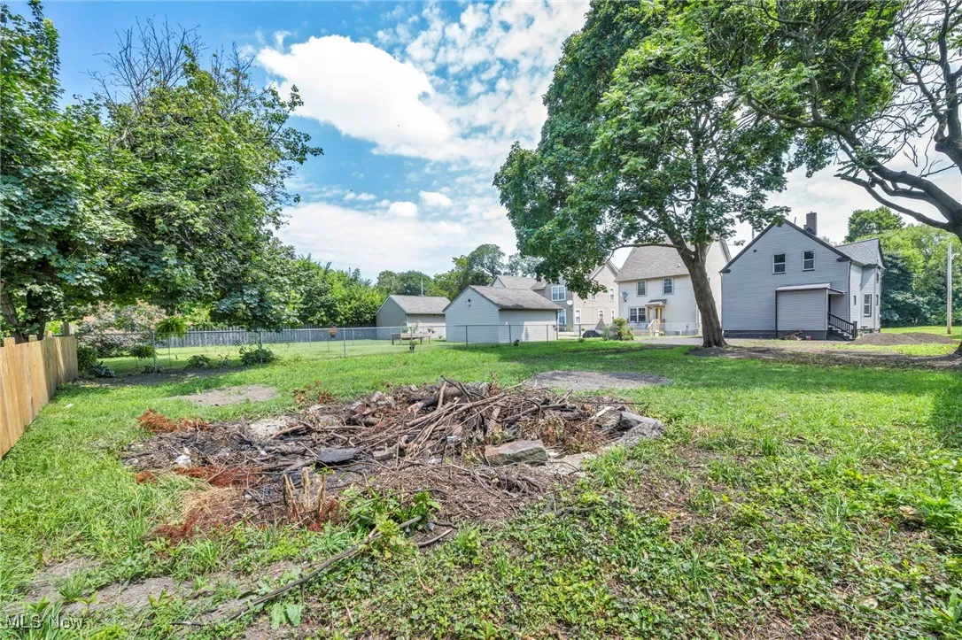 View of yard featuring a garage