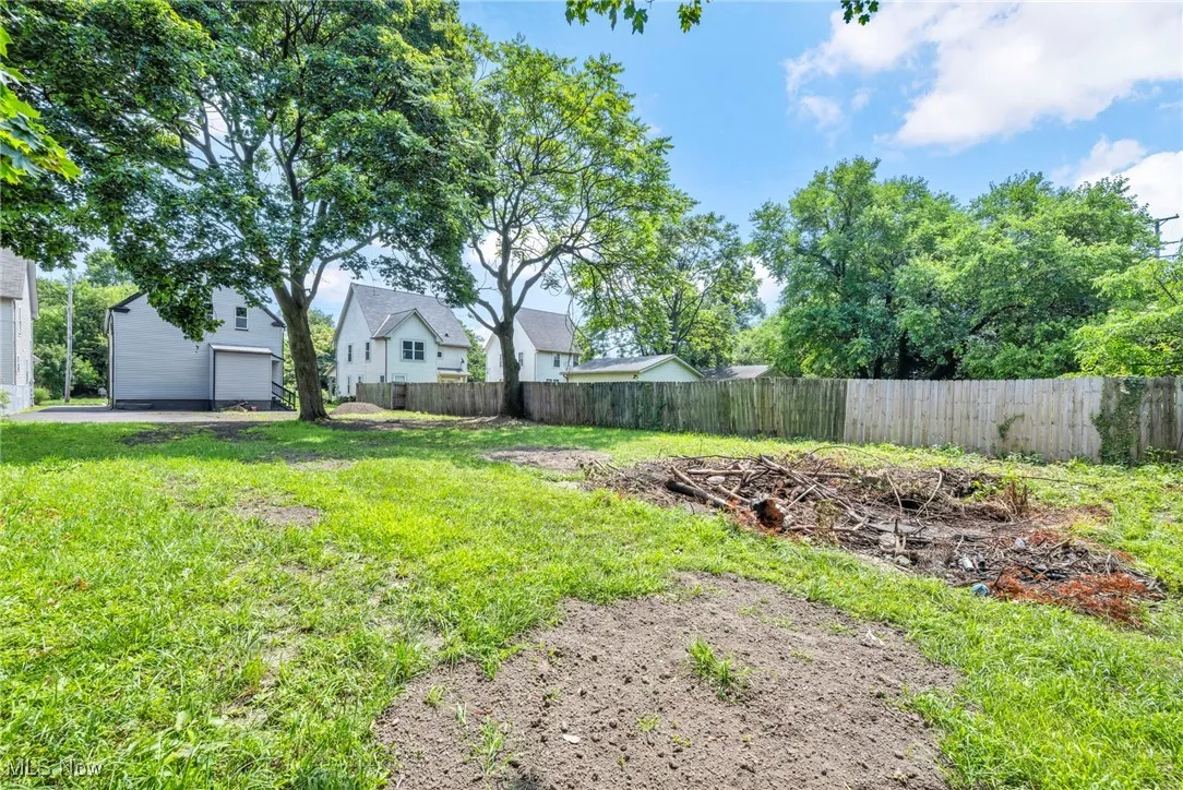 View of yard featuring a garage