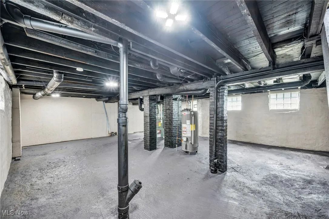Basement featuring gas water heater
