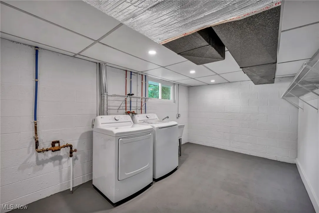 Laundry area with separate washer and dryer