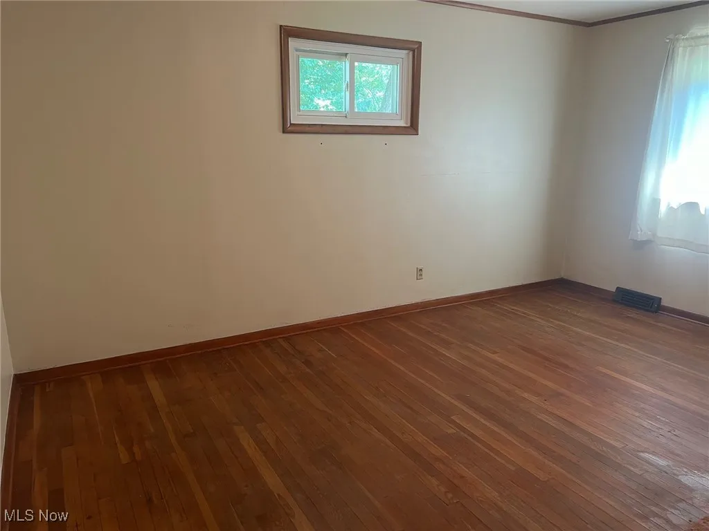Hardwood flooring with multiple windows