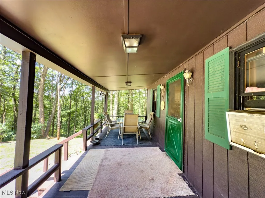 View of patio with outdoor dining space
