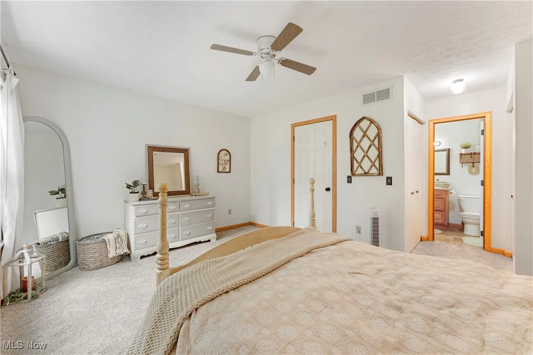 Bedroom with carpet