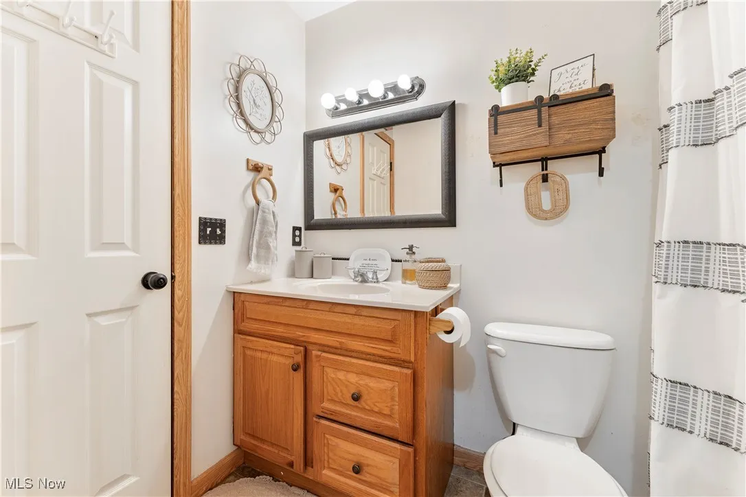 Bathroom with vanity and toilet